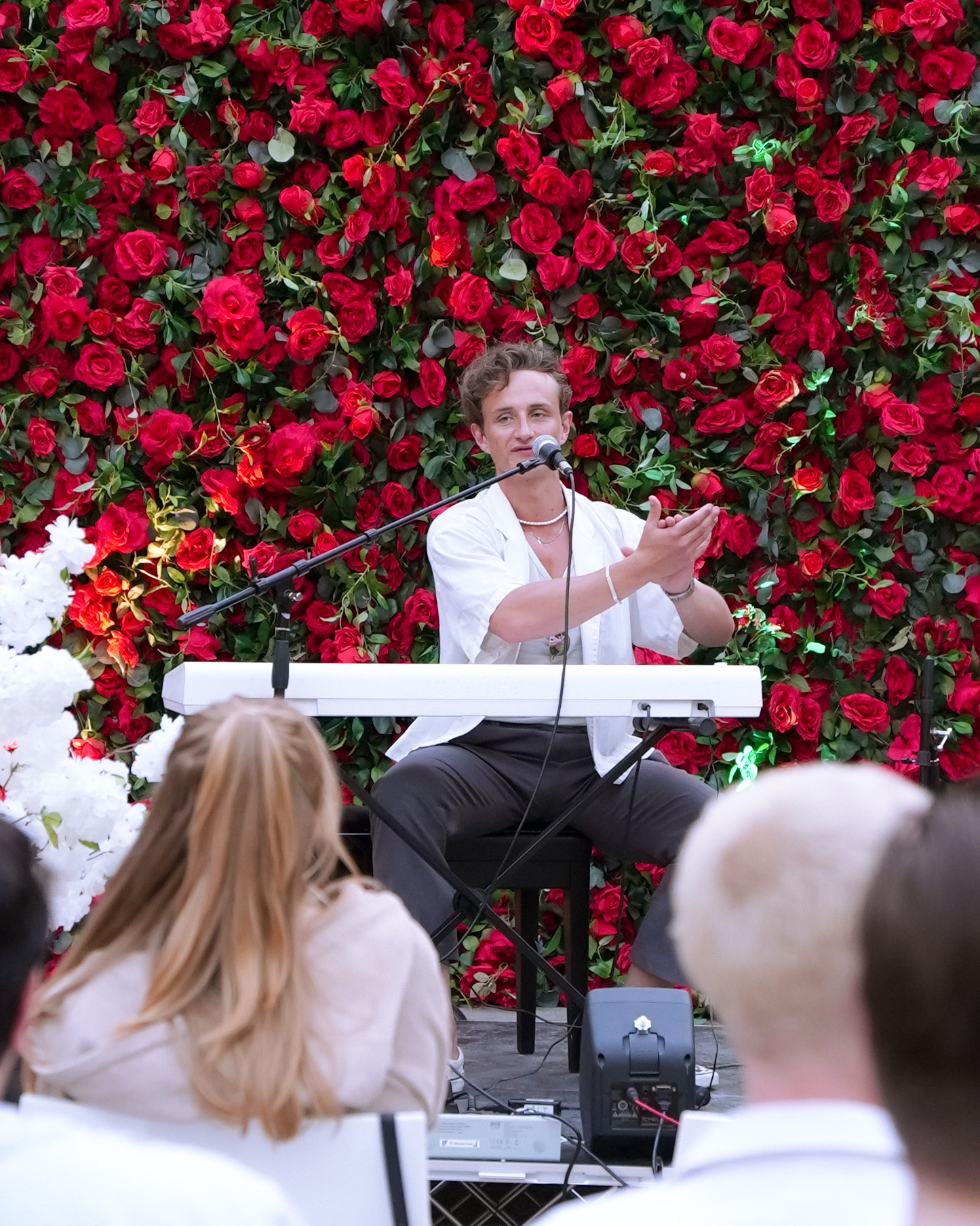 Piano against the rose wall